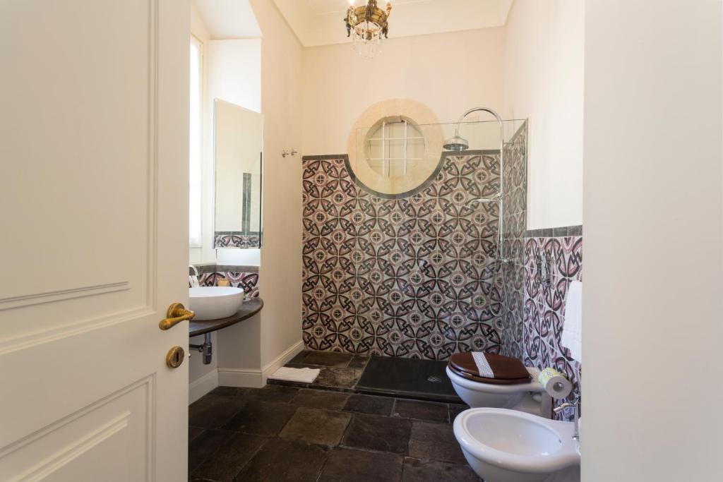 Koupelna v ubytování San Carlo Suites