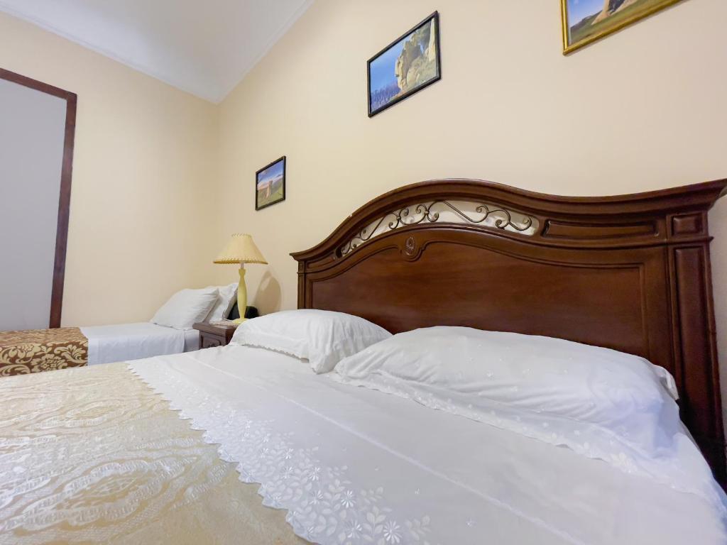 Posteľ alebo postele v izbe v ubytovaní Dolmen House