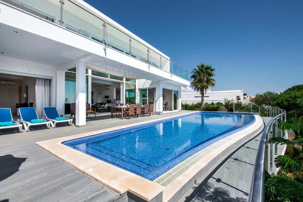 an image of a swimming pool in a house at Vista Mar by Algarve Villa Holidays in Sesmarias