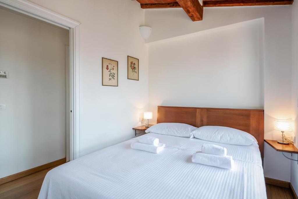 Voodi või voodid majutusasutuse San Marco Apartment with Panoramic View toas