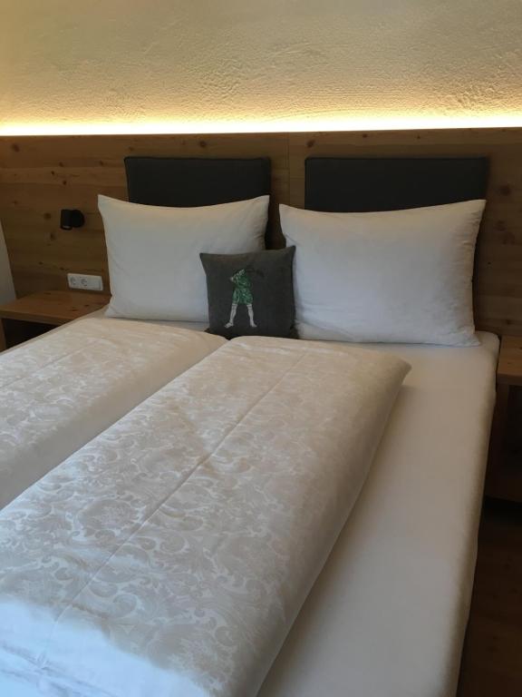 Posteľ alebo postele v izbe v ubytovaní Apartment Der Riese