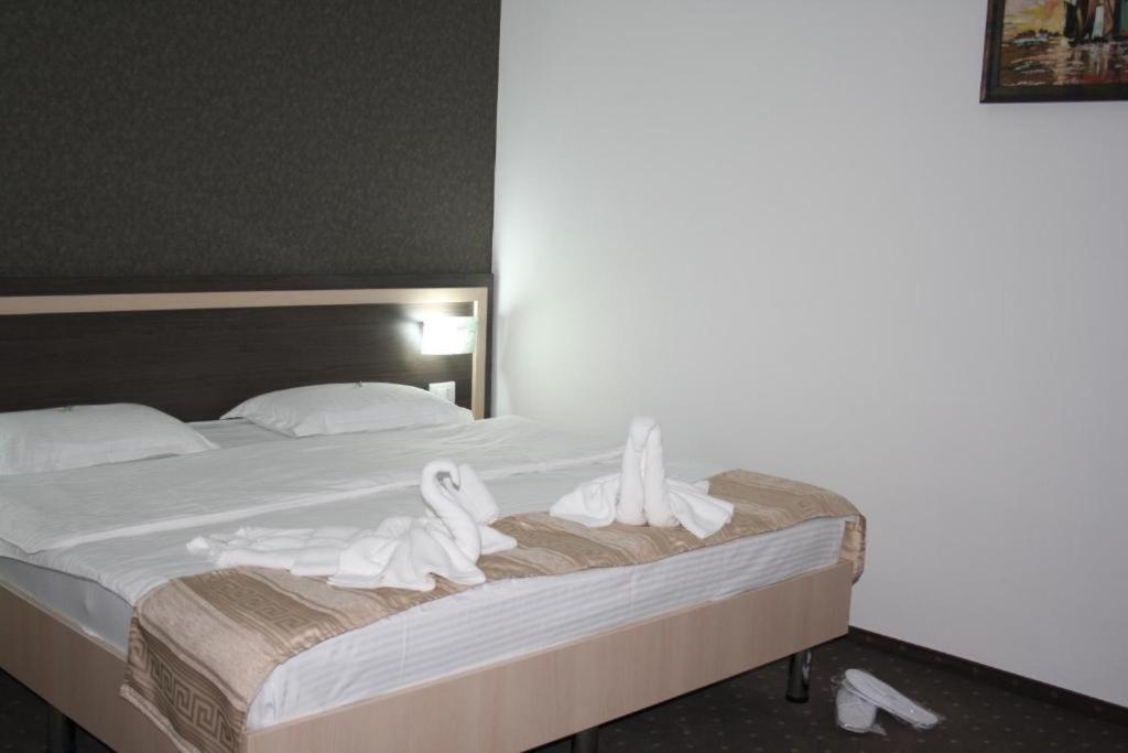 Postel nebo postele na pokoji v ubytování Hotel Solymar