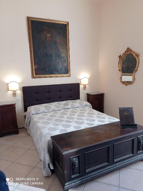 Postel nebo postele na pokoji v ubytování HOTEL TREVI Palazzo Natalini