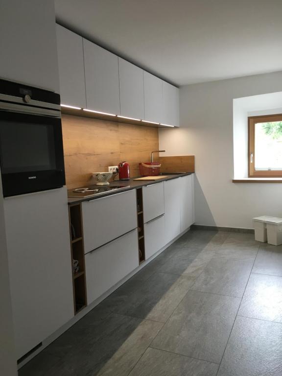 Kuchyňa alebo kuchynka v ubytovaní Apartment Der Riese