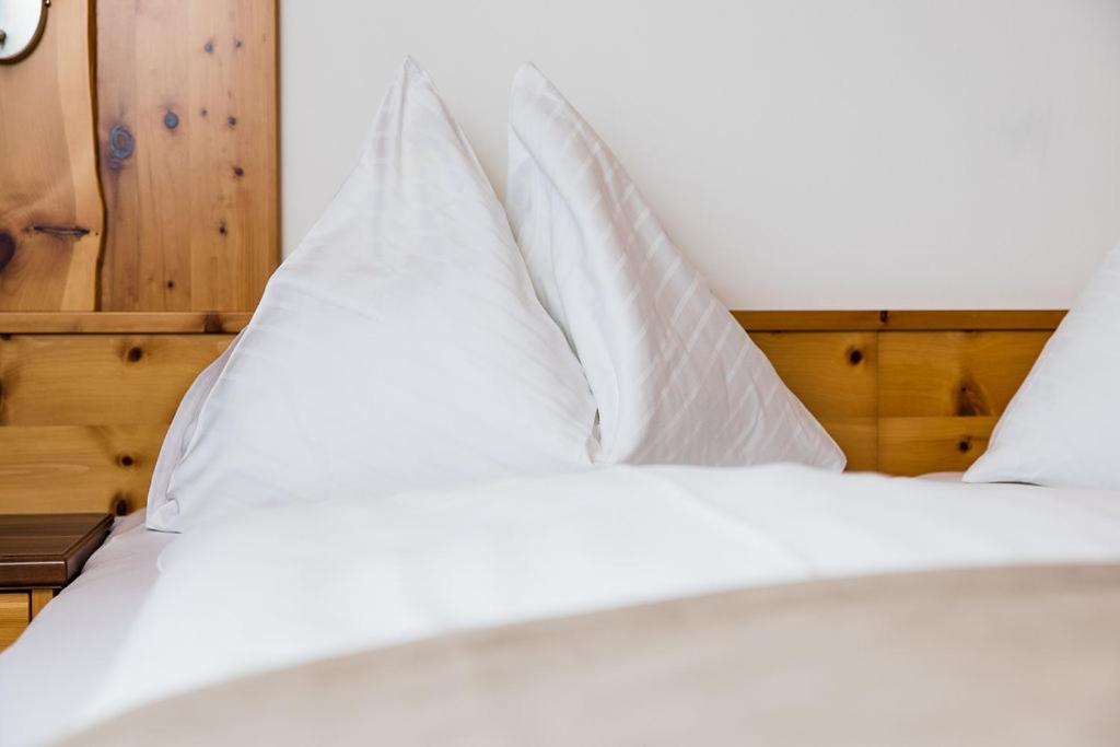 Postel nebo postele na pokoji v ubytování Hotel Langeck