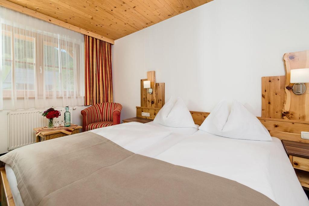 Postel nebo postele na pokoji v ubytování Hotel Langeck
