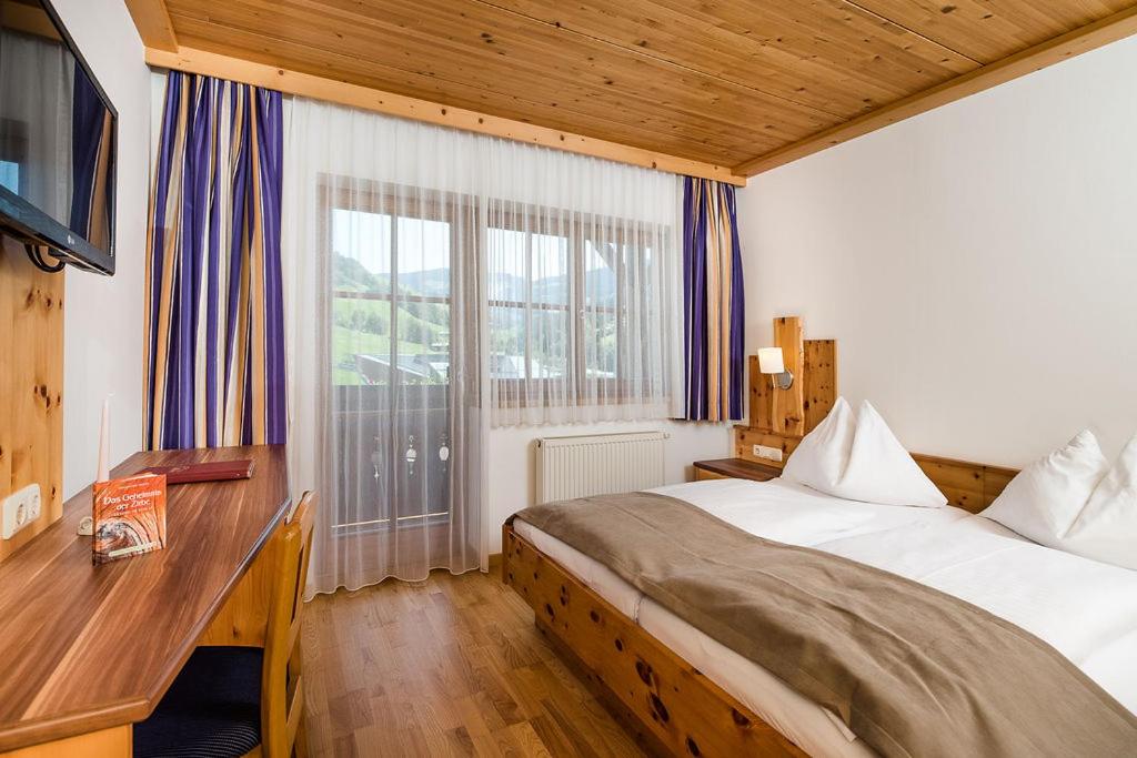 Postel nebo postele na pokoji v ubytování Hotel Langeck