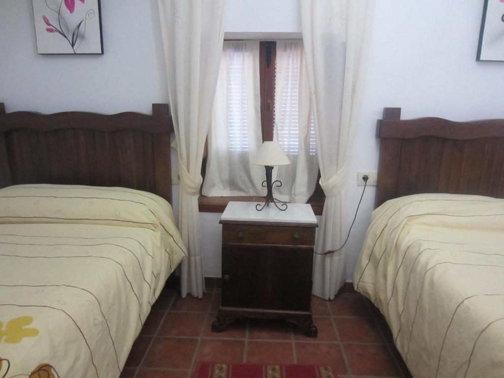 Postel nebo postele na pokoji v ubytování Cortijo "Era Grande 1"