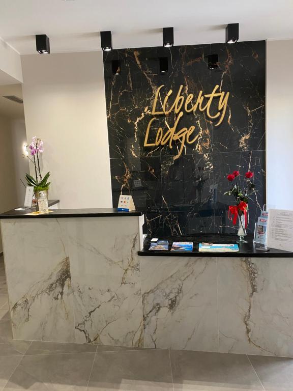 Certifikát, hodnocení, plakát nebo jiný dokument vystavený v ubytování Liberty Lodge