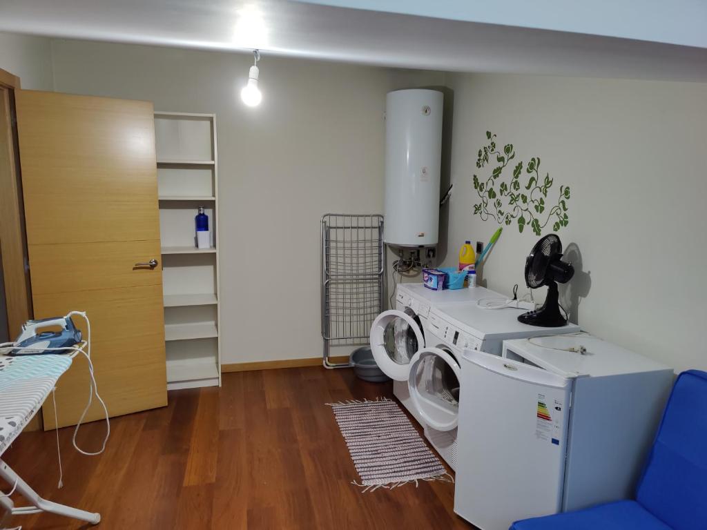 Kuchyň nebo kuchyňský kout v ubytování Rapadouro