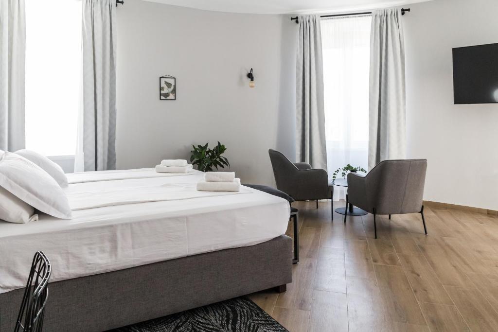 Posteľ alebo postele v izbe v ubytovaní Dolac apartments
