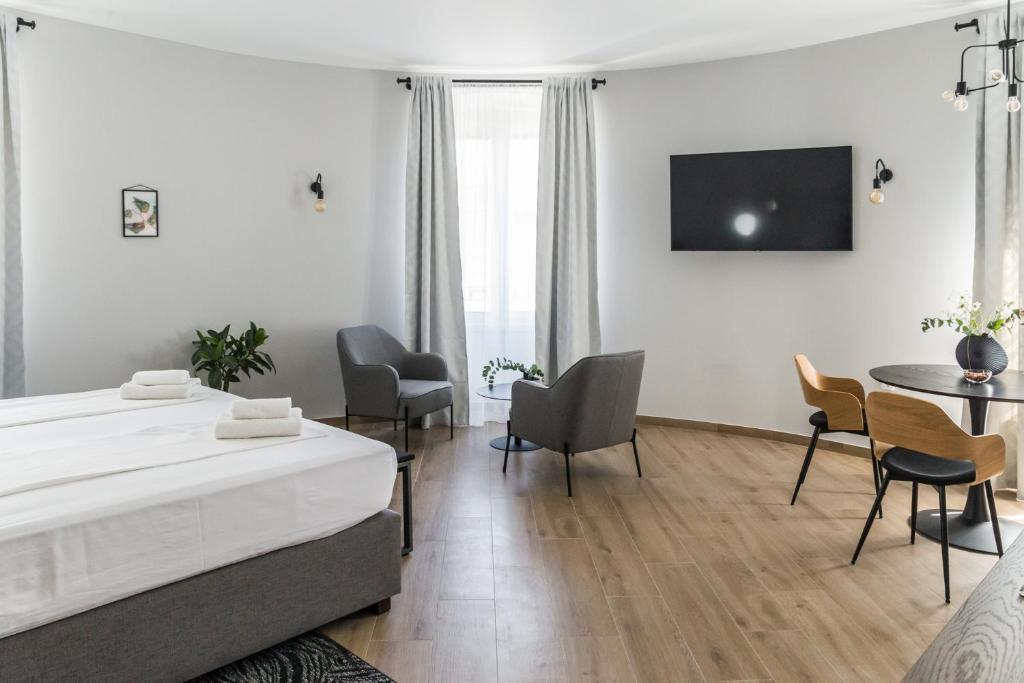 Posteľ alebo postele v izbe v ubytovaní Dolac apartments
