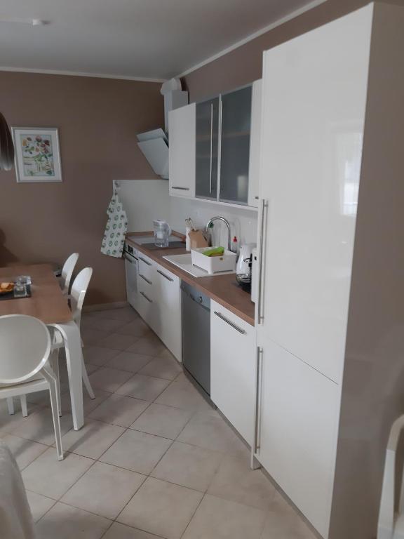 Kuchyň nebo kuchyňský kout v ubytování Apartment Luna Istriana