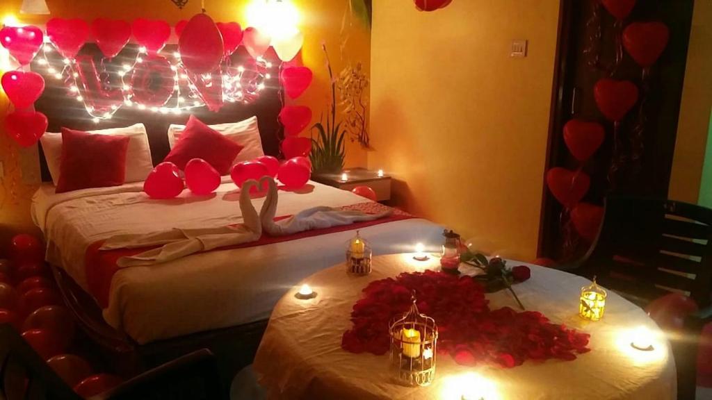 Postel nebo postele na pokoji v ubytování Ratna Resort near Bhubaneswar Airport