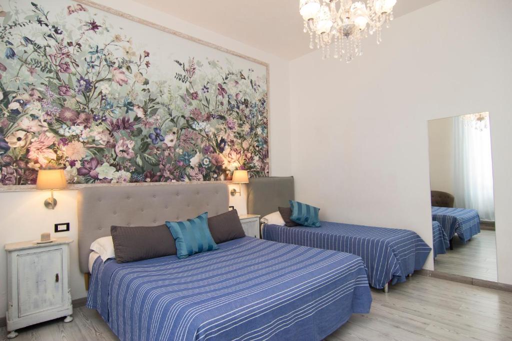 Postel nebo postele na pokoji v ubytování B&B 7 Rooms