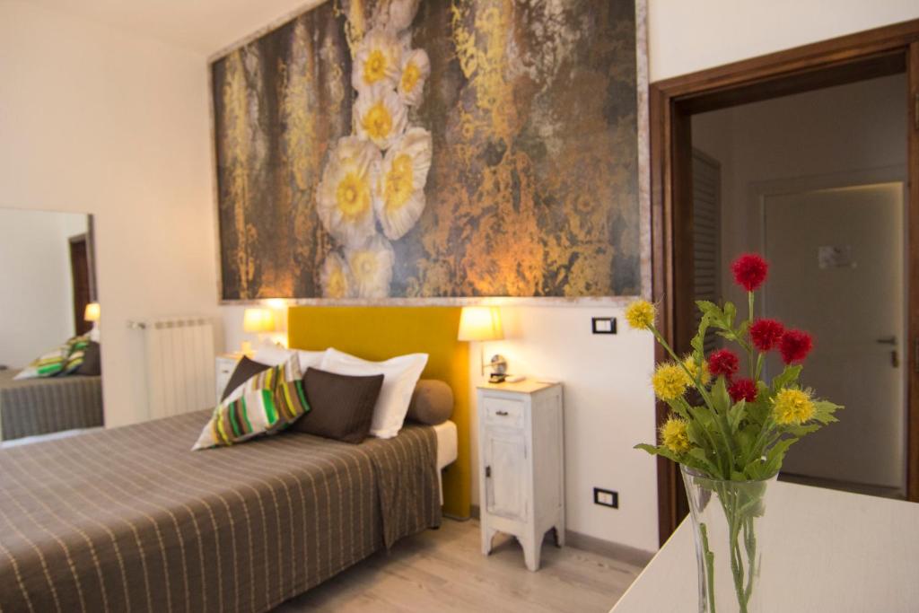 Postel nebo postele na pokoji v ubytování B&B 7 Rooms