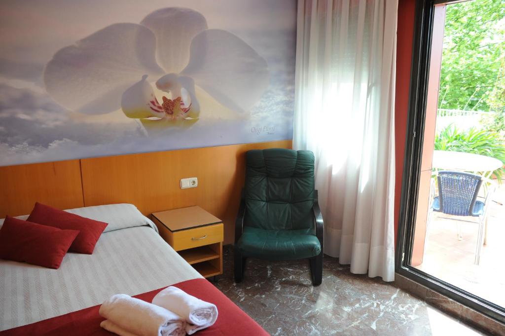 Postel nebo postele na pokoji v ubytování Hotel Aitana