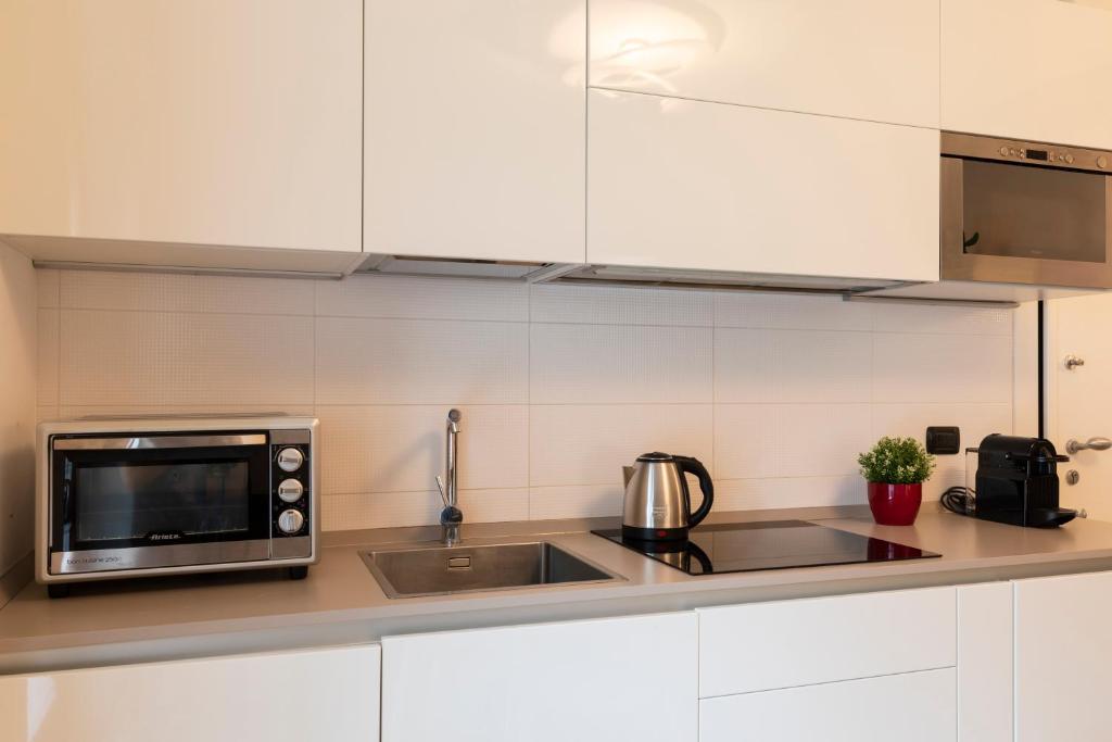 Kuchyňa alebo kuchynka v ubytovaní Navigli Stylish Home