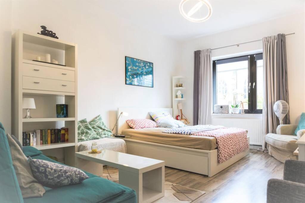 Tempat tidur dalam kamar di Beautiful Cozy 1-Room apartment, near Rhine