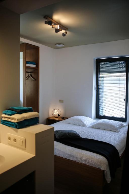 Postel nebo postele na pokoji v ubytování Hotel Gasthof Kapelhof