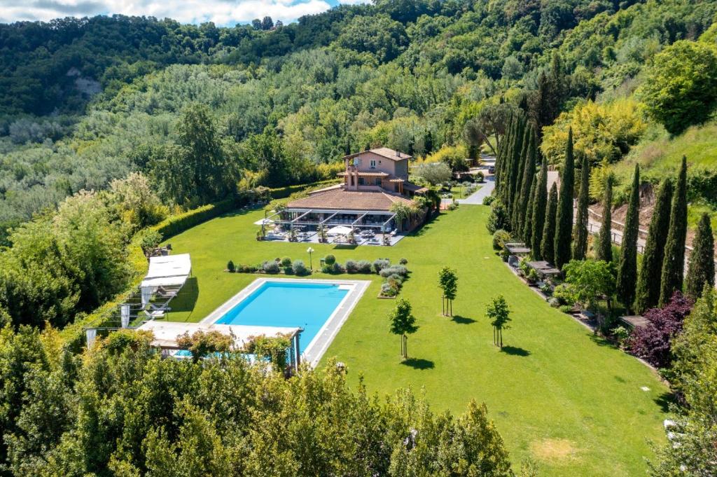 Bazén v ubytovaní L'Olivo Country Resort & SPA alebo v jeho blízkosti