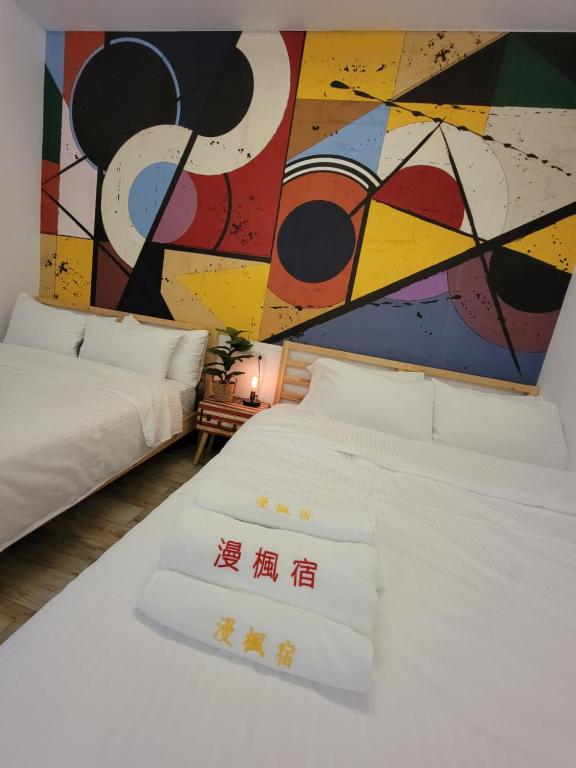 Postel nebo postele na pokoji v ubytování Red Rose B&B漫楓宿民宿 桃園市民宿110號