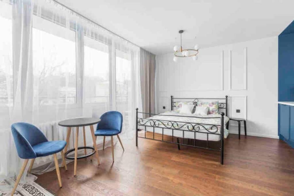Posteľ alebo postele v izbe v ubytovaní Apartament Warszawa Centrum-blisko Starego Miasta