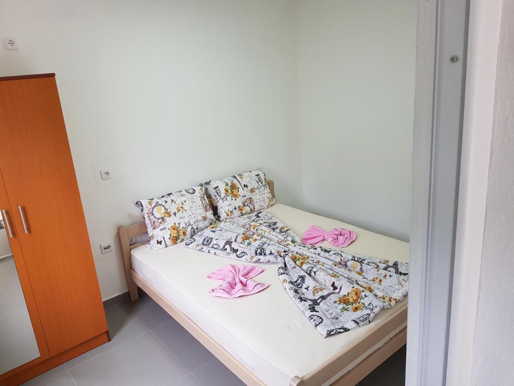 Postel nebo postele na pokoji v ubytování Apartmani Vila Ebra