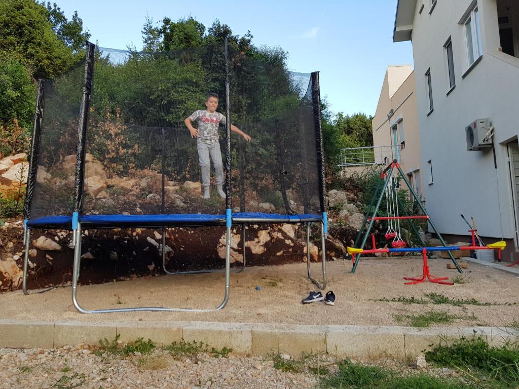 Herní místnost nebo prostor pro děti v ubytování Apartmani Vila Ebra