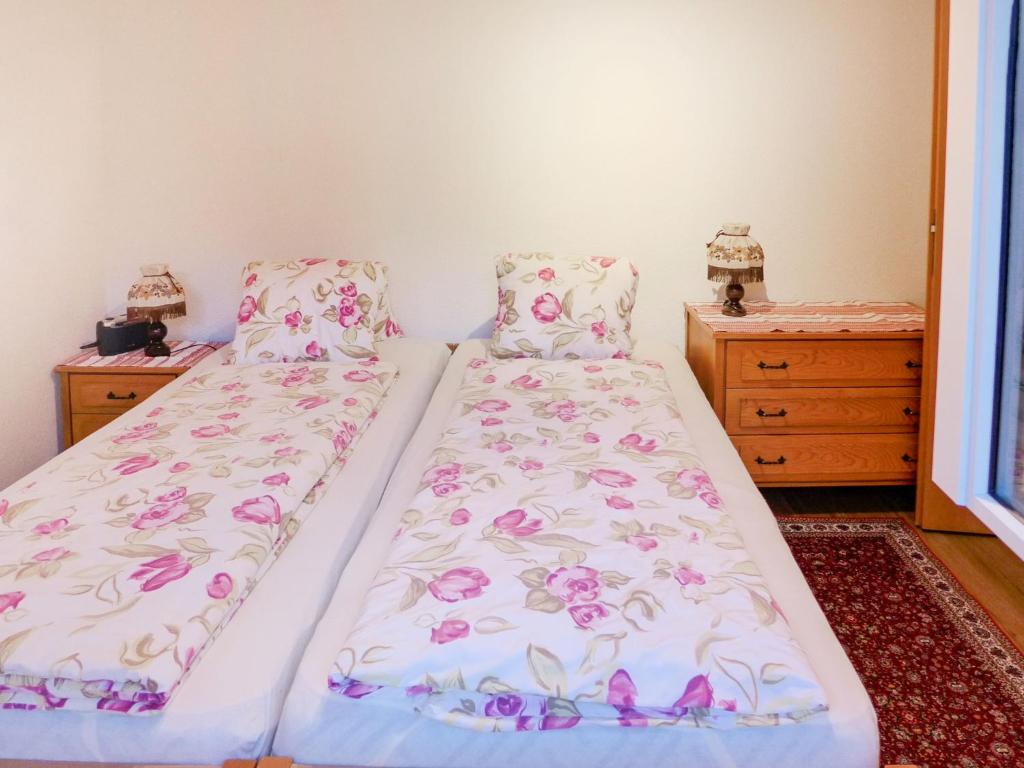 Postel nebo postele na pokoji v ubytování Apartment Erika by Interhome