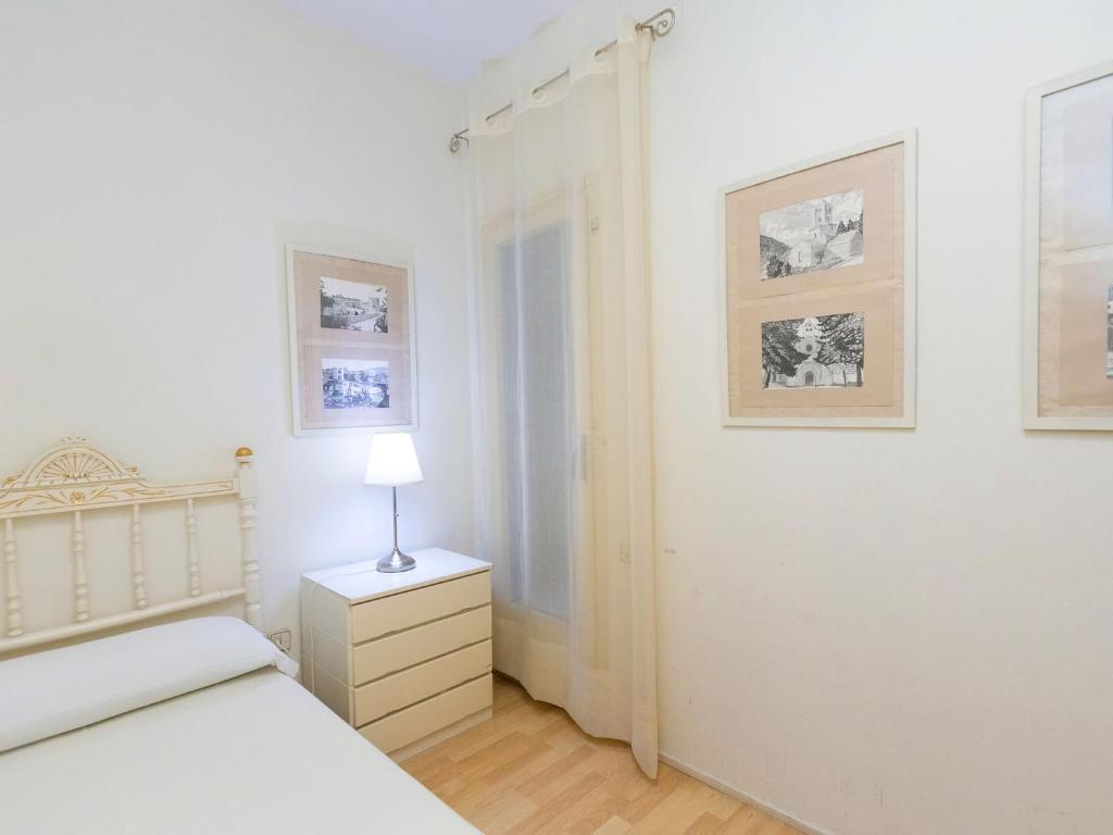 Posteľ alebo postele v izbe v ubytovaní Apartment Eixample Dret Corsega Roger Lluria by Interhome