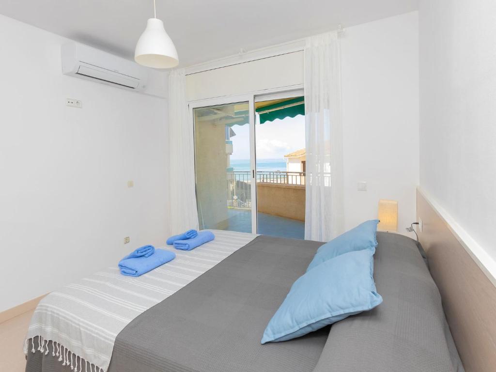 A bed or beds in a room at Apartment Blue Sea by Interhome