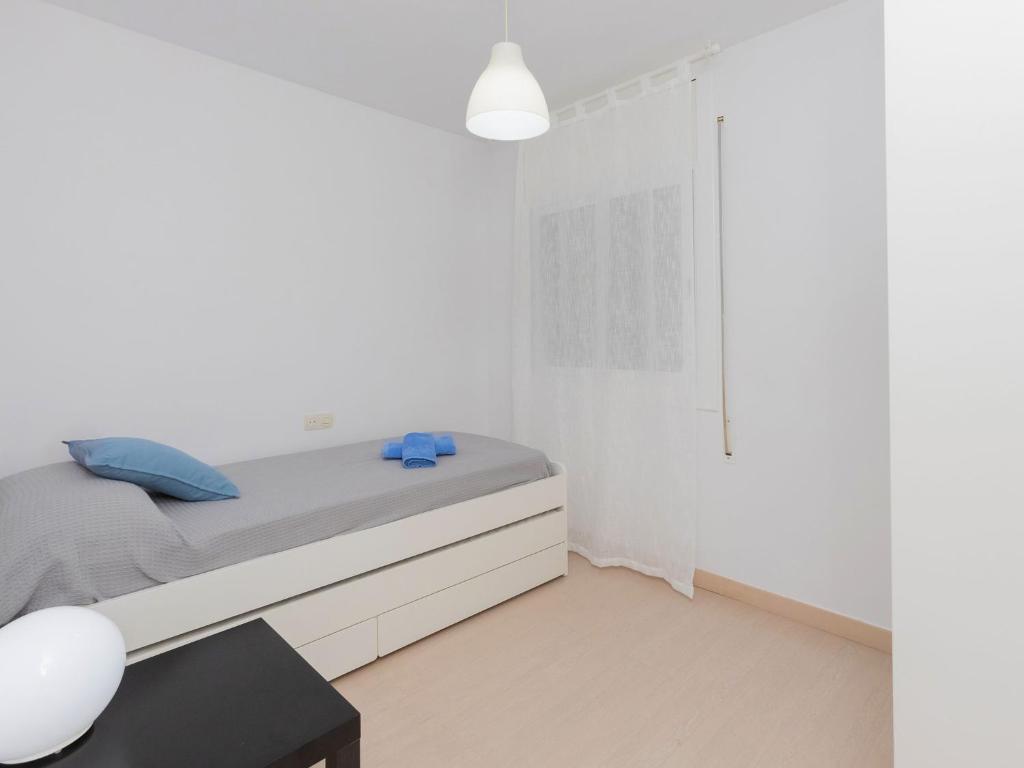 A bed or beds in a room at Apartment Blue Sea by Interhome