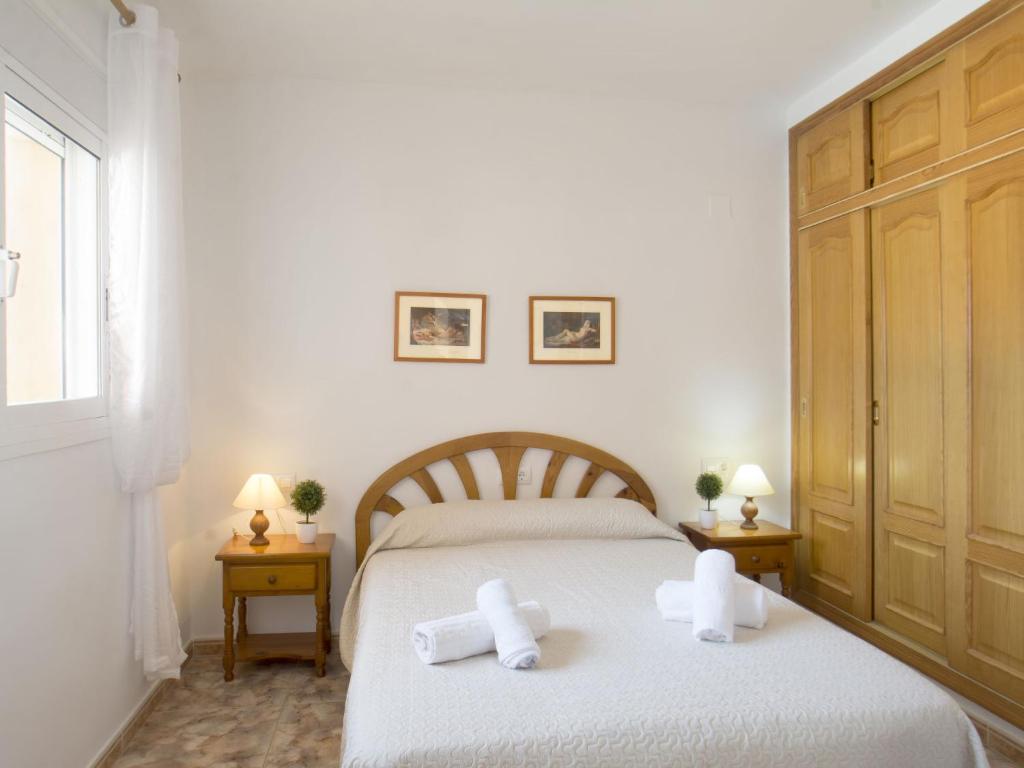 Posteľ alebo postele v izbe v ubytovaní Villa Gardenia by Interhome