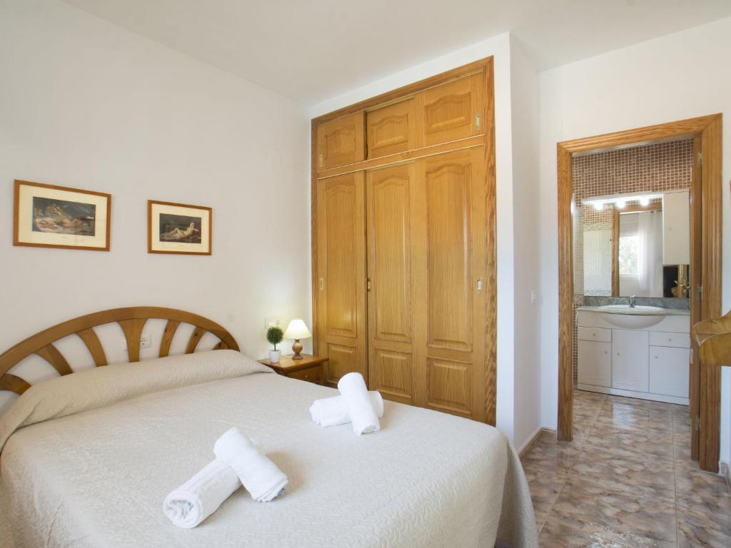 Posteľ alebo postele v izbe v ubytovaní Villa Gardenia by Interhome