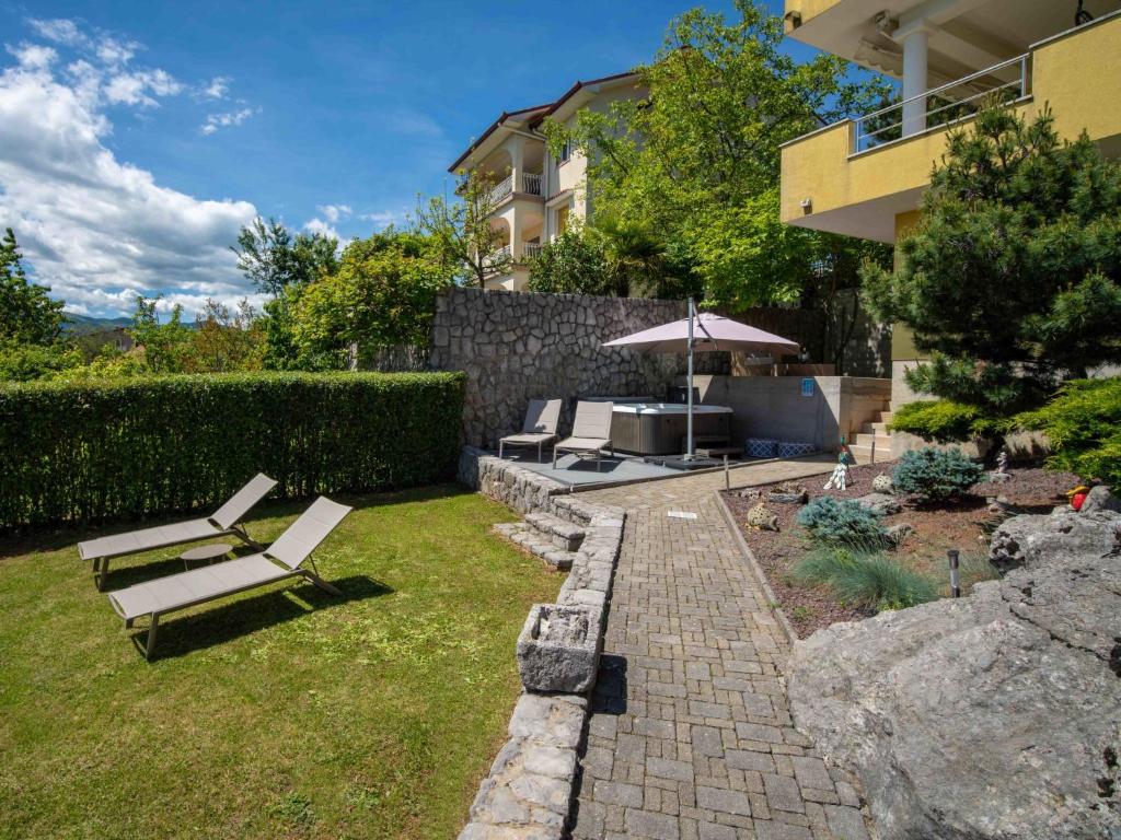 Vonkajšia záhrada v ubytovaní Apartment Kvarner house-2 by Interhome