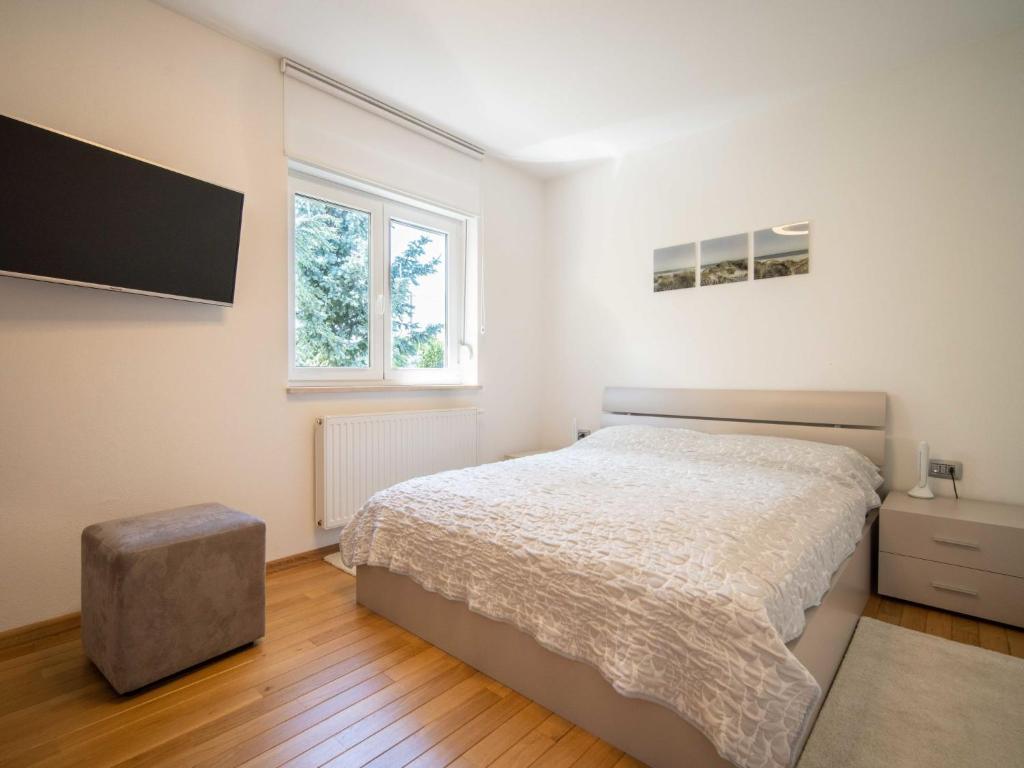 Posteľ alebo postele v izbe v ubytovaní Apartment Kvarner house-2 by Interhome