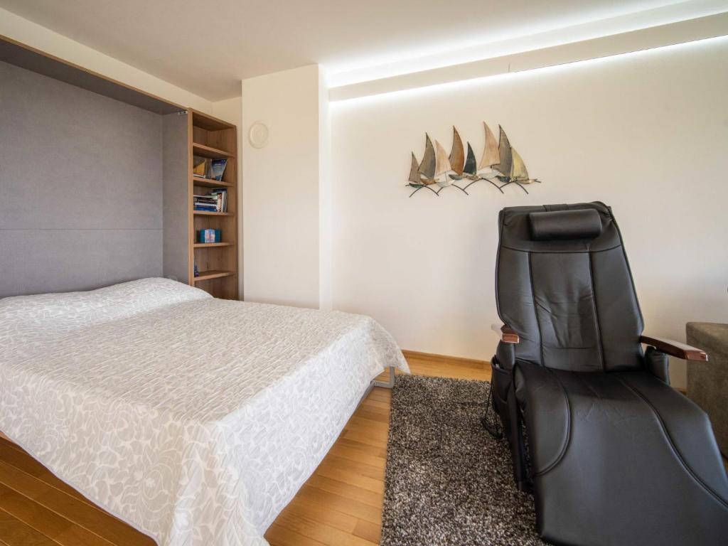 Posteľ alebo postele v izbe v ubytovaní Apartment Kvarner house-2 by Interhome