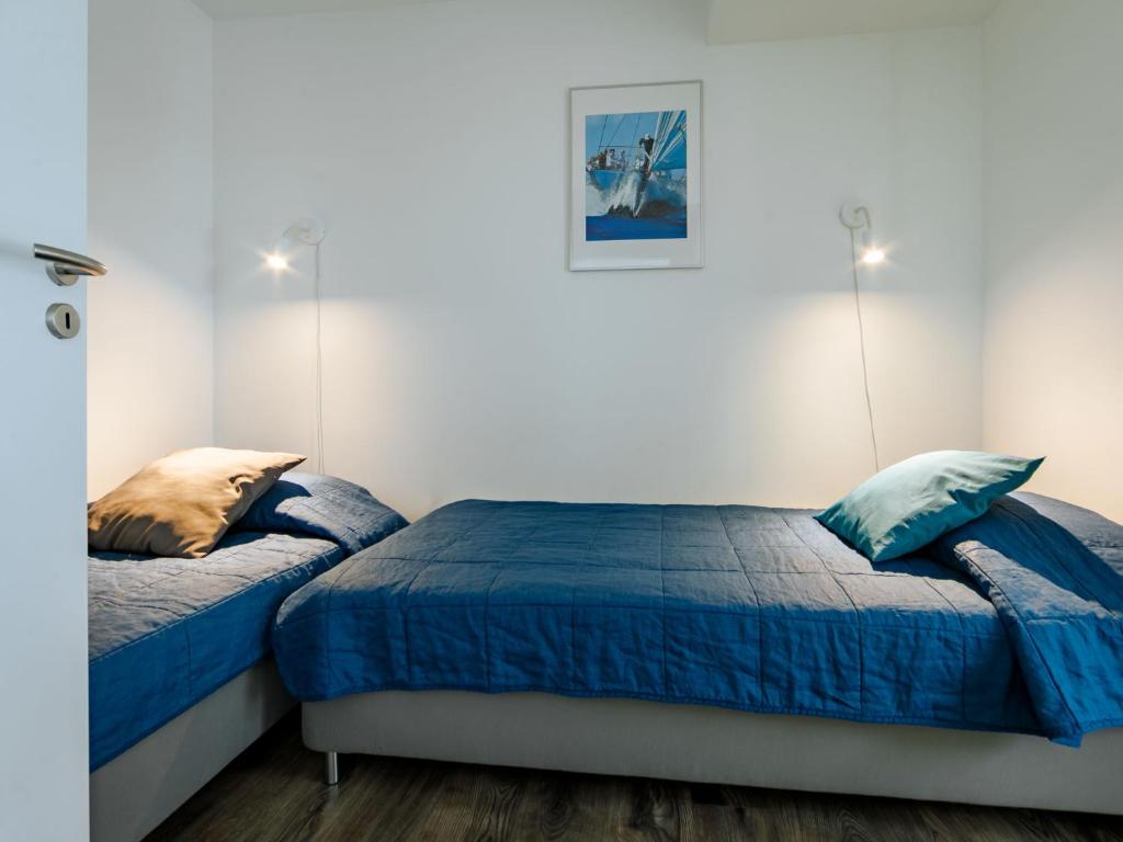 Posteľ alebo postele v izbe v ubytovaní Apartment Siófok by Interhome