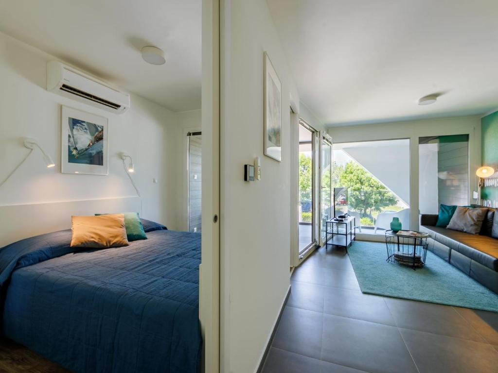 Posteľ alebo postele v izbe v ubytovaní Apartment Siófok by Interhome