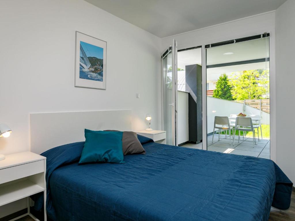 Posteľ alebo postele v izbe v ubytovaní Apartment Földvár by Interhome