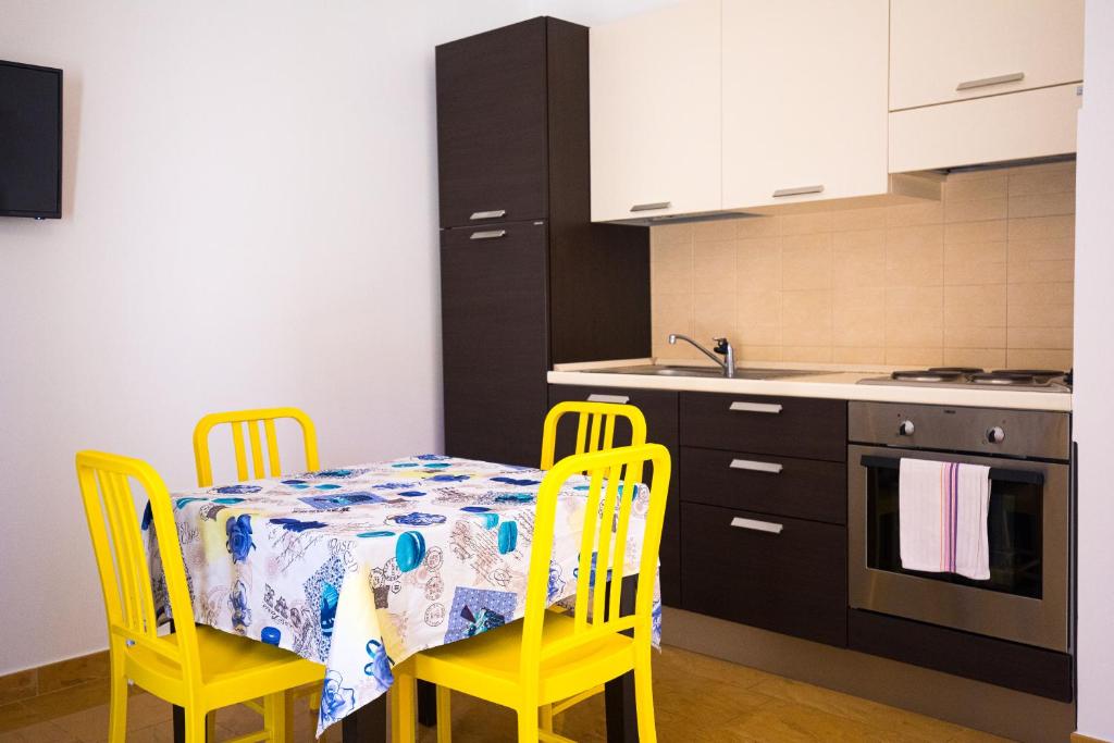 Kuchyň nebo kuchyňský kout v ubytování Donnosanto Residence