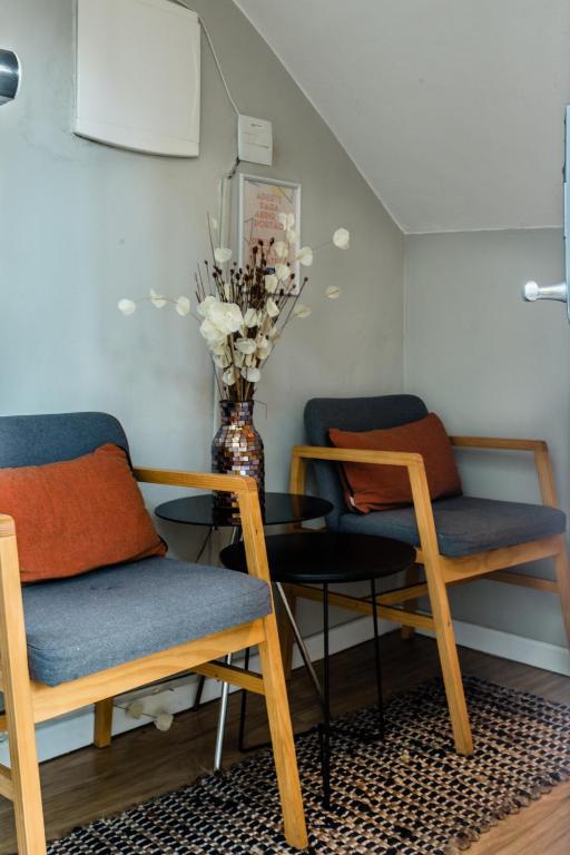 Uma área de estar em Injoy Lofts & Studios Ipanema