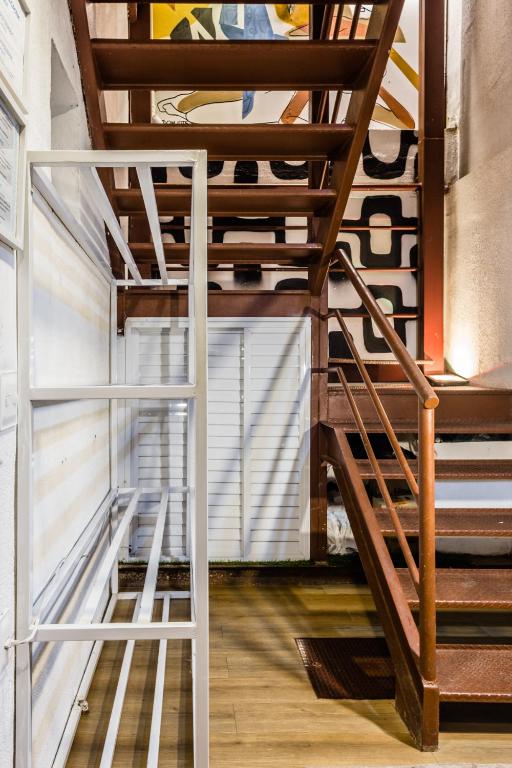 Uma ou mais camas em beliche em um quarto em Injoy Lofts & Studios Ipanema