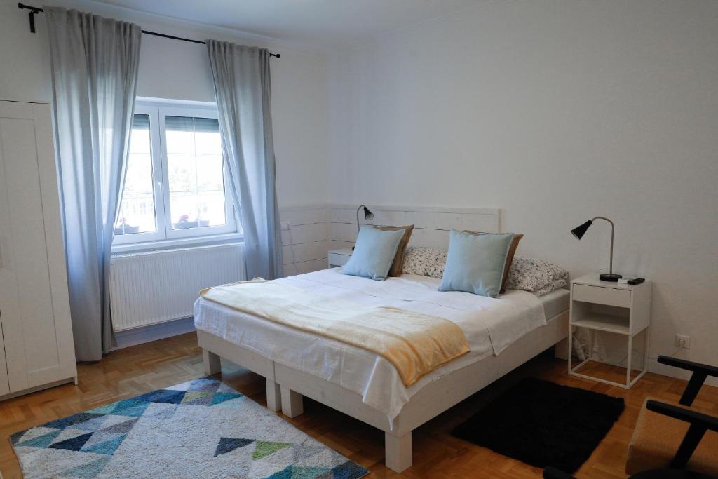 Postel nebo postele na pokoji v ubytování Apartman 3