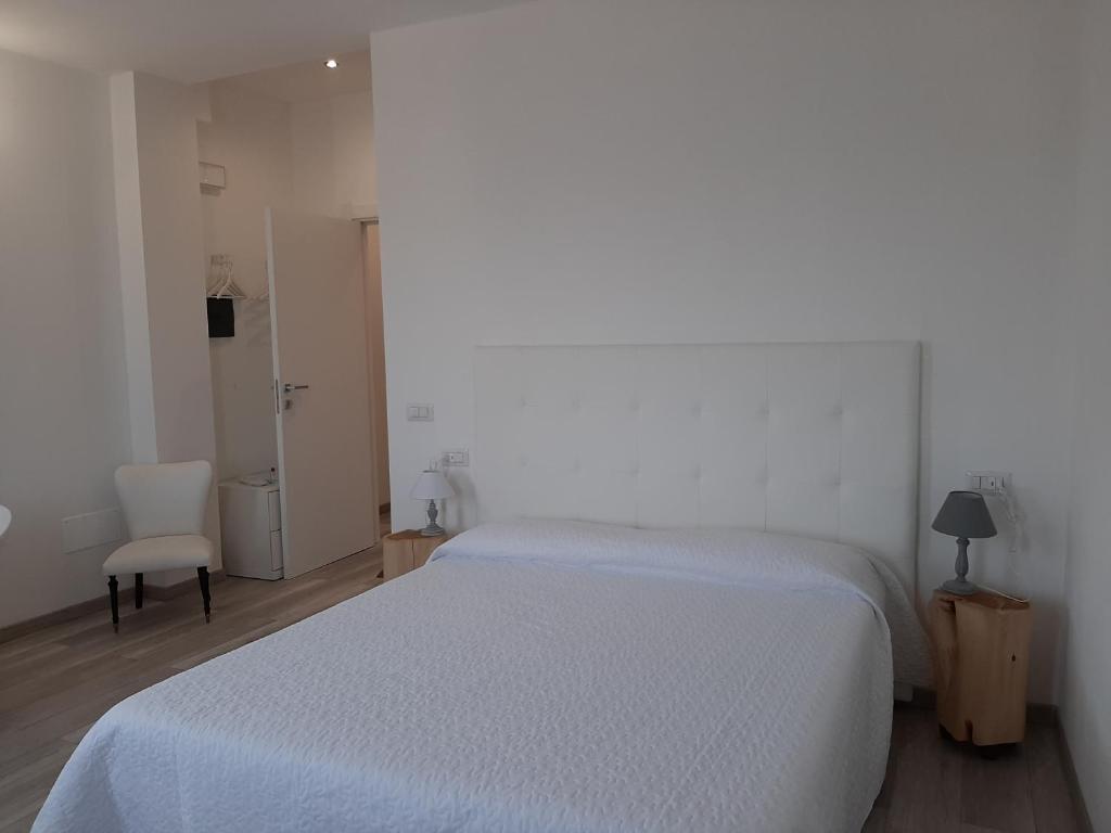 Łóżko lub łóżka w pokoju w obiekcie B&B da Baba