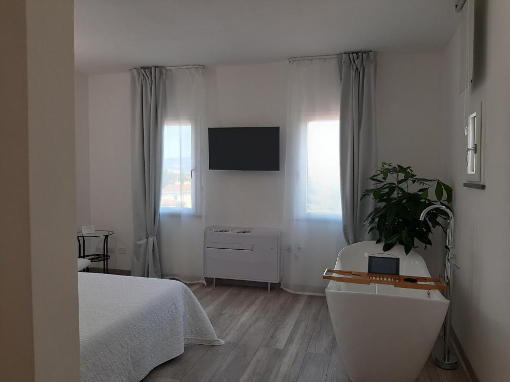 Łóżko lub łóżka w pokoju w obiekcie B&B da Baba