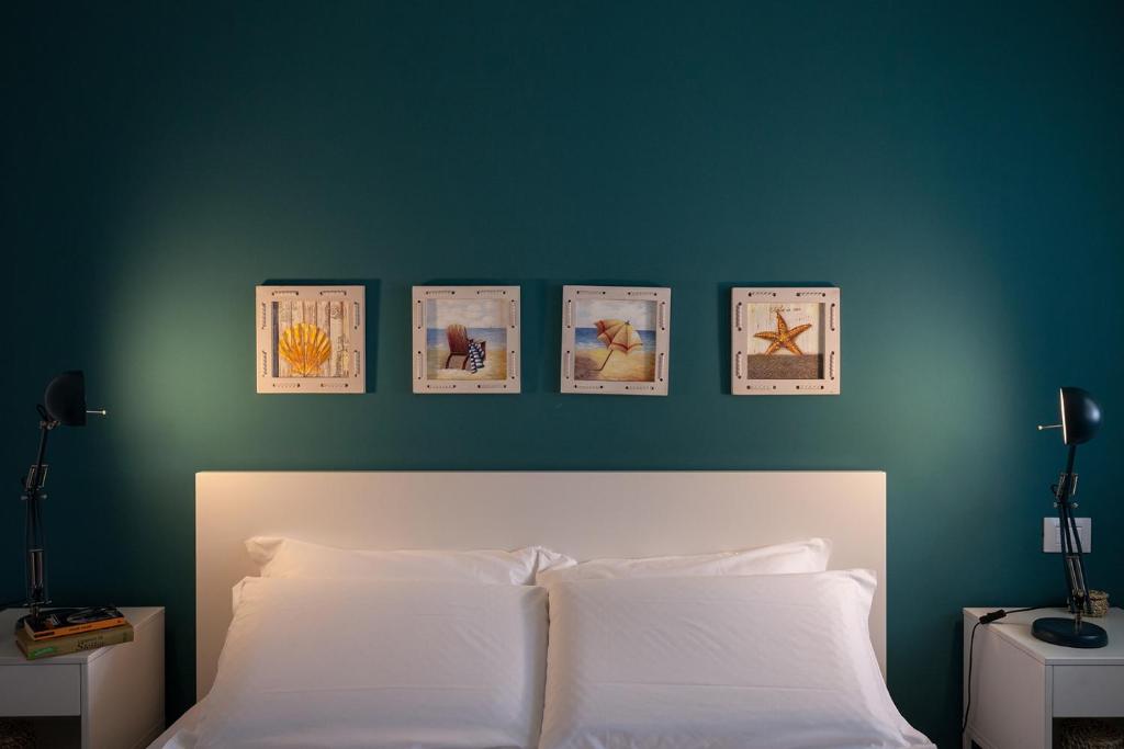 Posteľ alebo postele v izbe v ubytovaní Nerissa suites&rooms