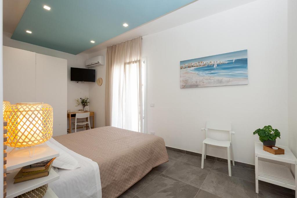 Posteľ alebo postele v izbe v ubytovaní Nerissa suites&rooms