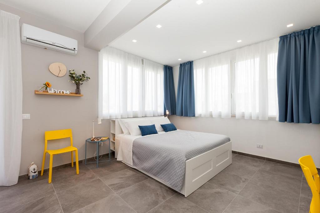 Posteľ alebo postele v izbe v ubytovaní Nerissa suites&rooms
